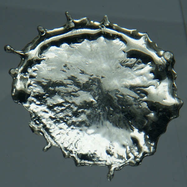 Droplet of solidified molten tin.
